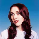 Photo of Em Beihold, American singer-songwriter