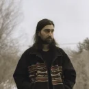 Photo of Noah Kahan, American Singer & Songwriter